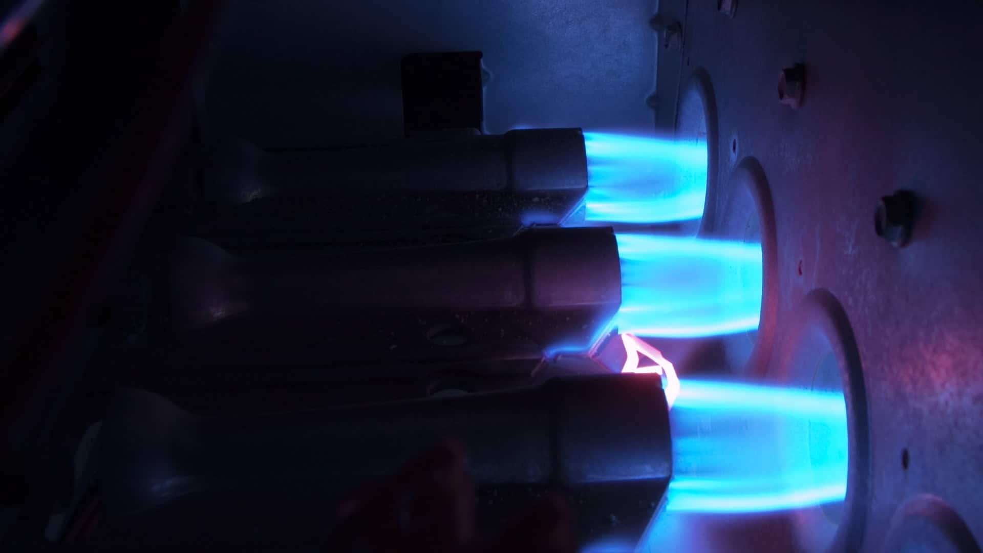 Burners inside a furnace burning home heating oil.