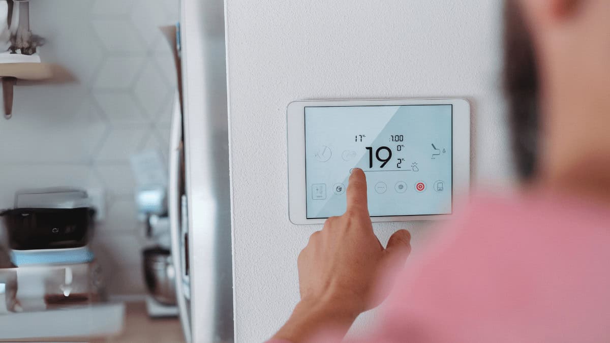 Smart thermostat control for home heating and energy efficiency by McDougall Energy.