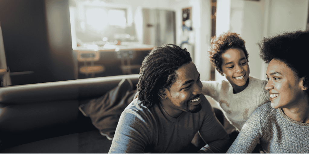 family inside laughing